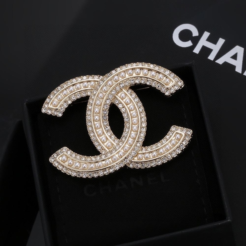 Ch**el brooches